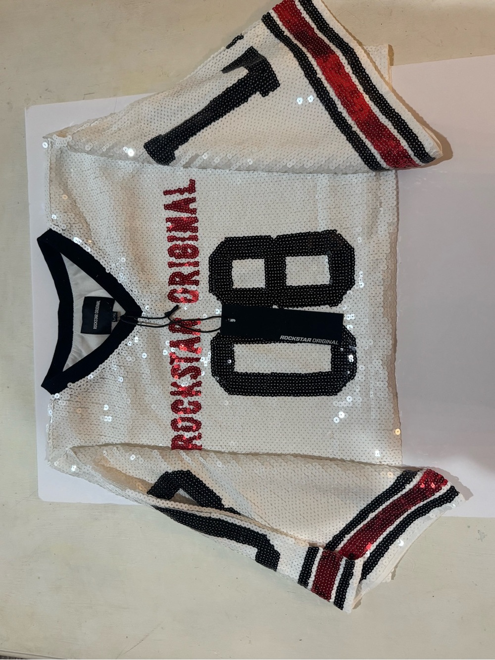 Rockstar Original Sequin Jersey Top - White with Black & Red Details
